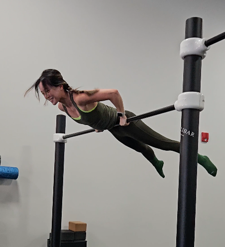 Gillian Lying On Pullup Bar